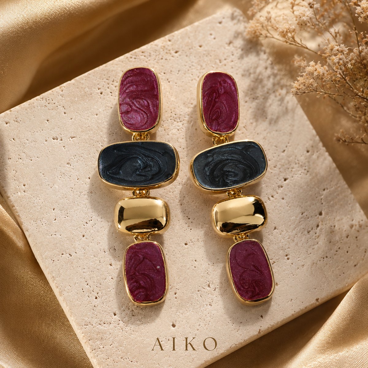 Aretes geométricos dorados con detalles rojo y negro - 3