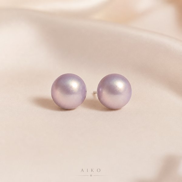 Aretes perlados en forma circular 