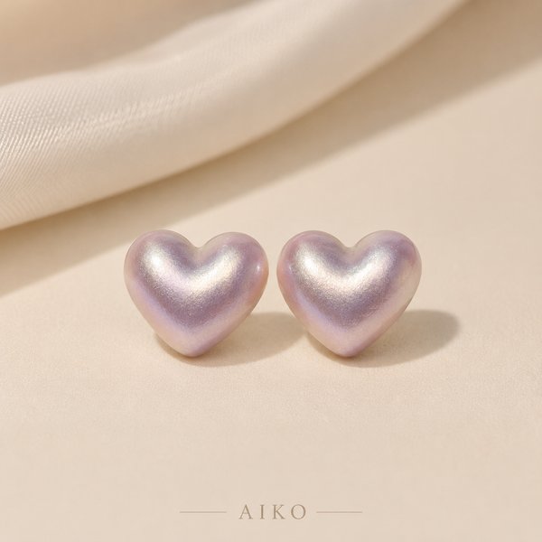 Aretes perlados en forma de corazon