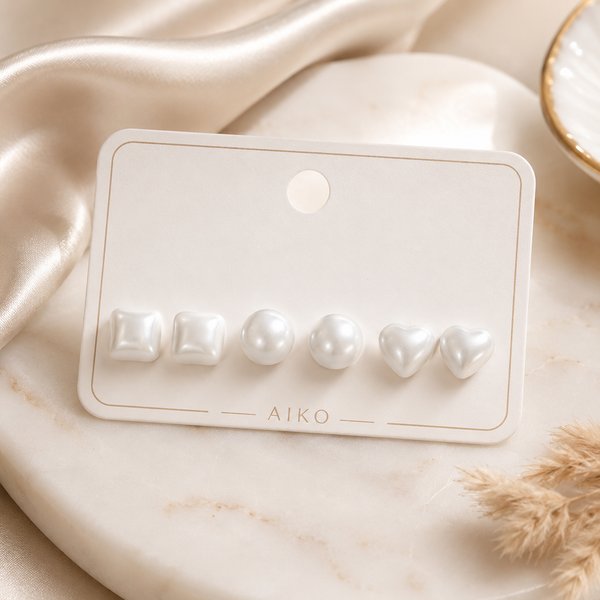 Aretes perlados en forma cuadrada