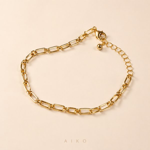 Pulsera dorada de eslabones alargados