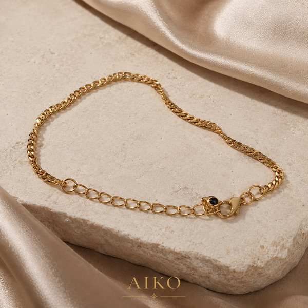 Pulsera dorada fina con eslabones mixtos