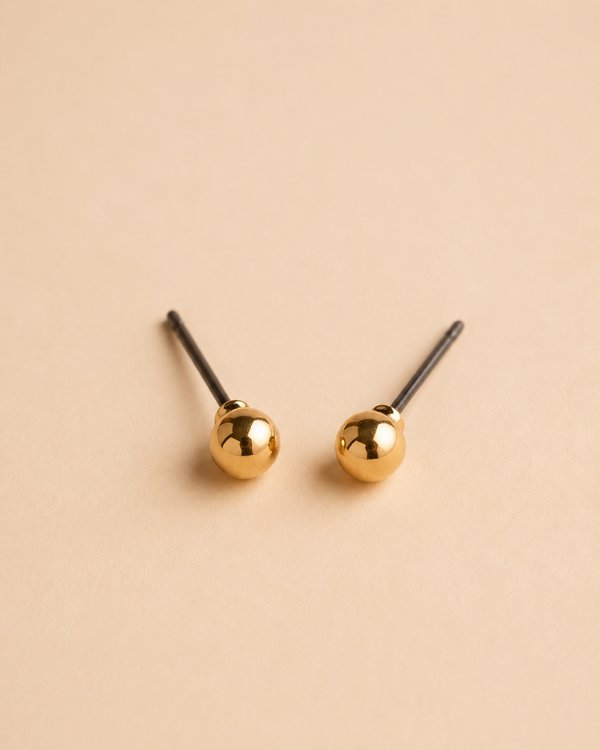Aretes dorados de bolita