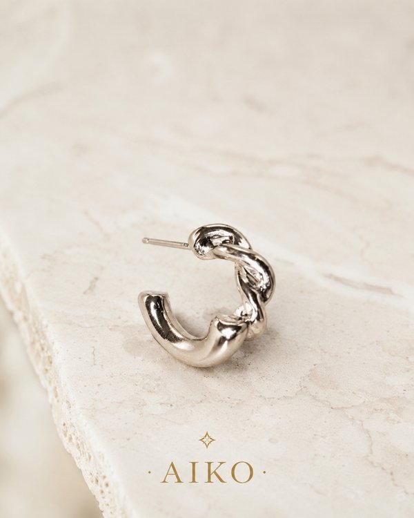 Aretes tipo argolla trenzada
