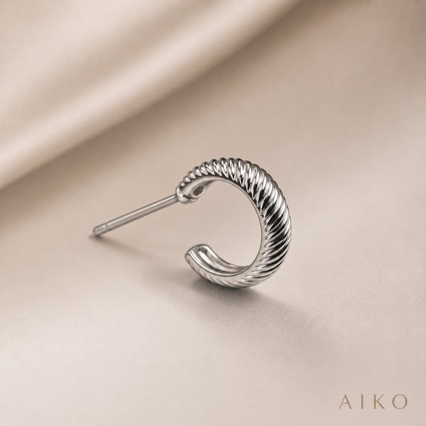 Aretes tipo argolla gruesa texturizada