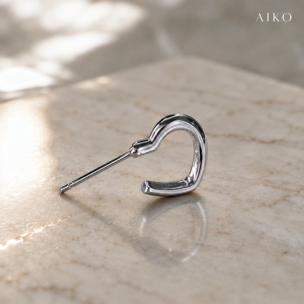 Aretes tipo corazón metálico