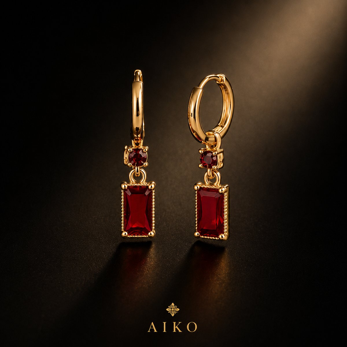 Aretes dorados con piedra roja rectangular - 2