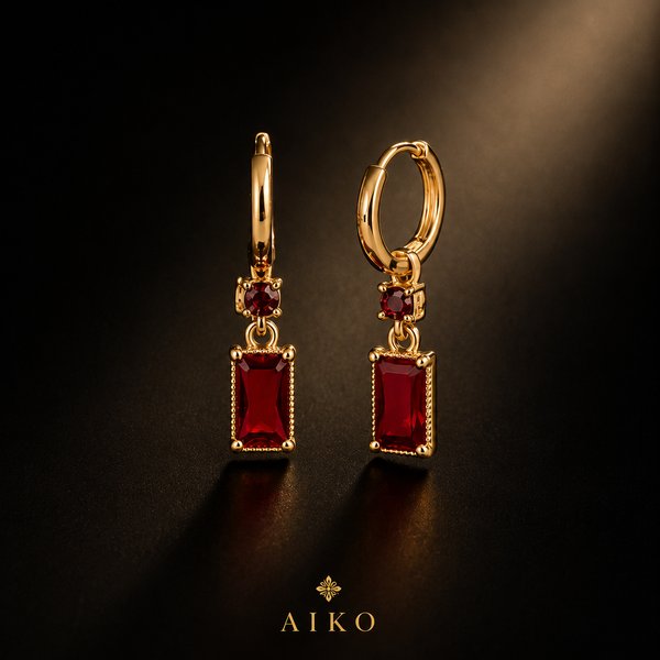 Aretes dorados con piedra roja rectangular