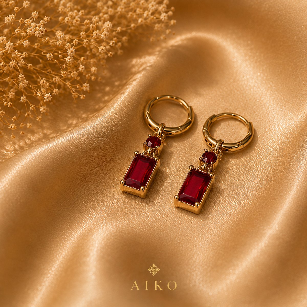 Aretes dorados con piedra roja rectangular - 4