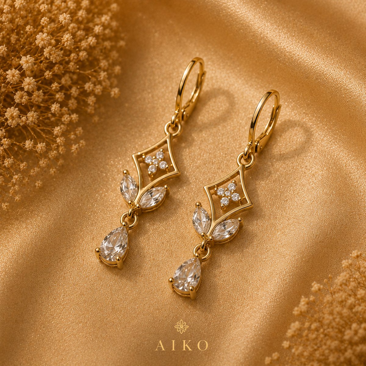 Aretes dorados con cristales y forma de angel - 2