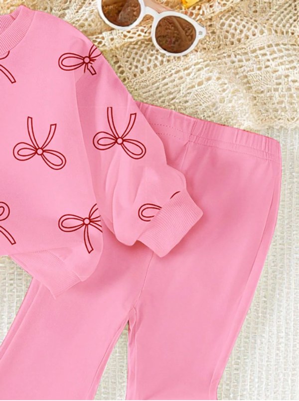 Conjunto rosa con buzo estampado 
