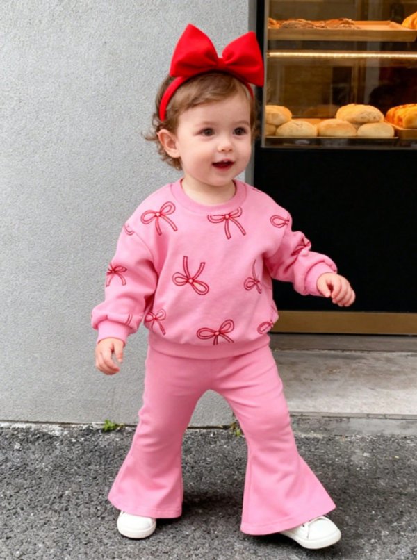 Conjunto rosa con buzo estampado 