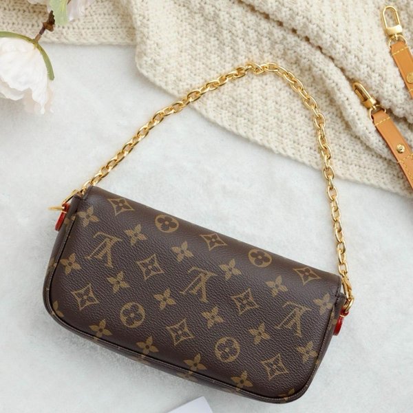 Louis Vuitton- Ivy con cadena - Marrón