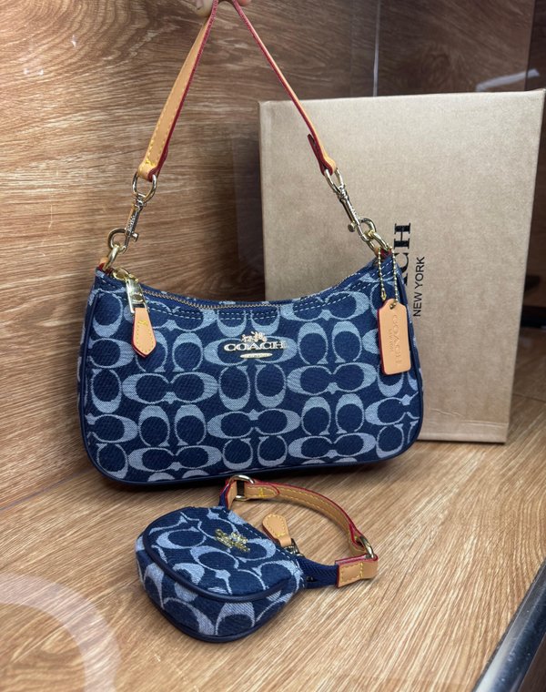 Baguette Coach jeans 