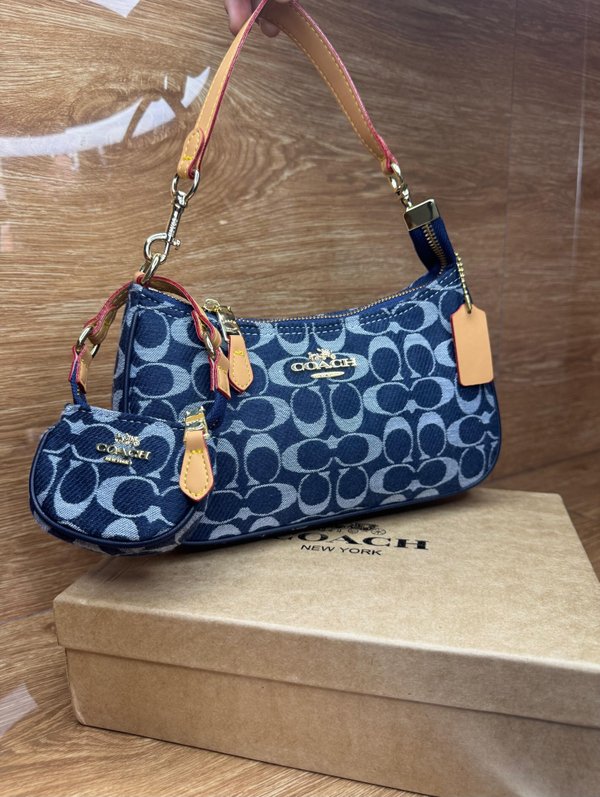 Baguette Coach jeans 