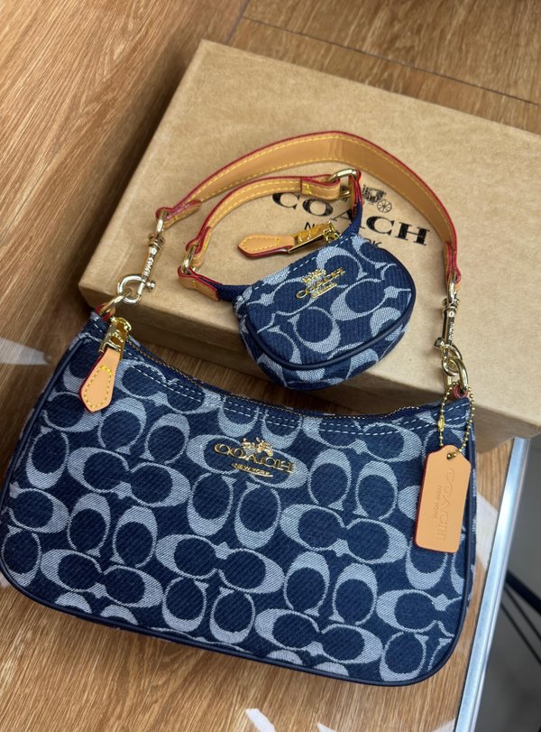 Baguette Coach jeans 