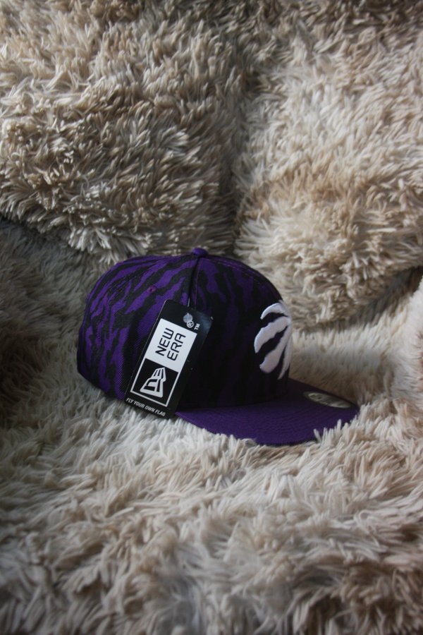 Gorra Toronto Raptors – New Era 9Fifty (Morada/Negro)