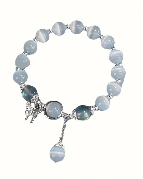 🦋 Pulsera de Ópalo Sintético con Dije de Mariposa – Elegancia Mística y Encanto Natural