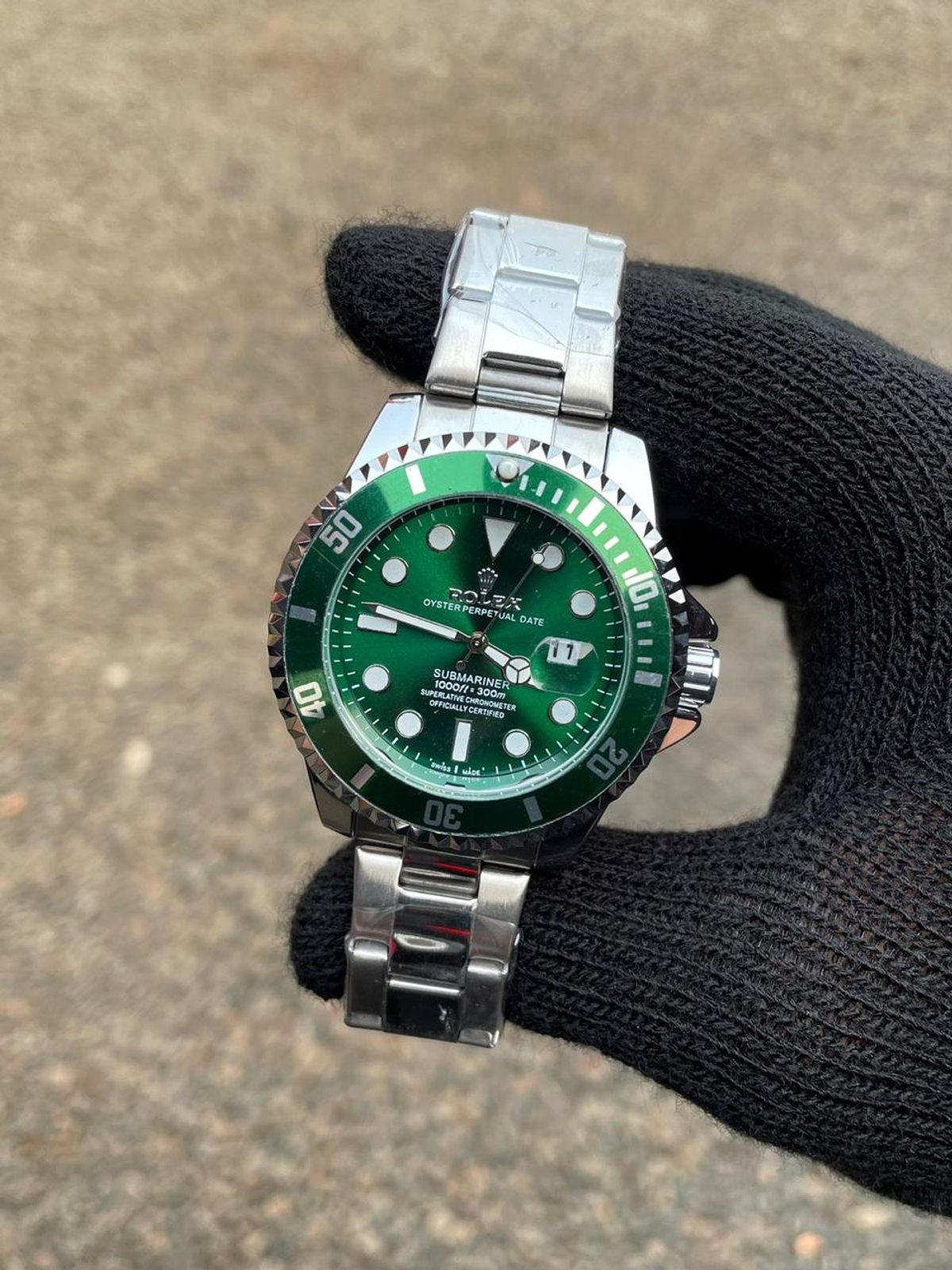 Rolex Submariner Plateado Fondo Verde