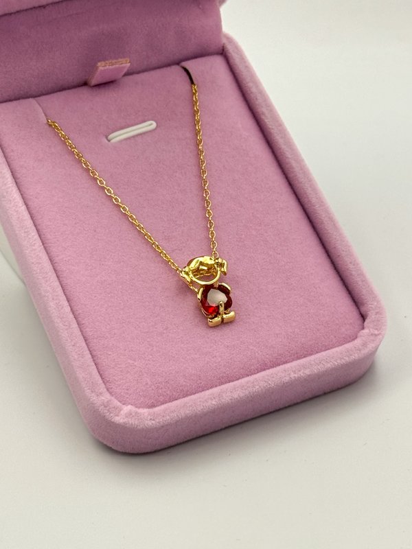 Niña corazón rojo