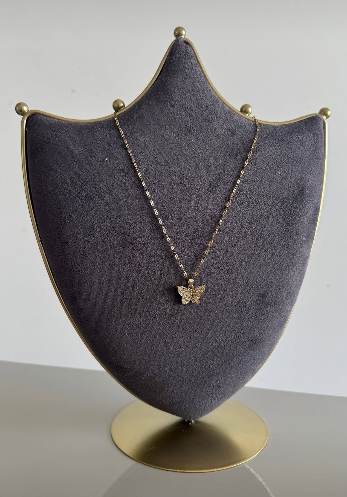 Collar mariposa