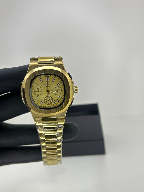 Patek Philippe Nautilus Cronógrafo Gold Steel – Champagne Monocromático con Malla de Acero Dorada