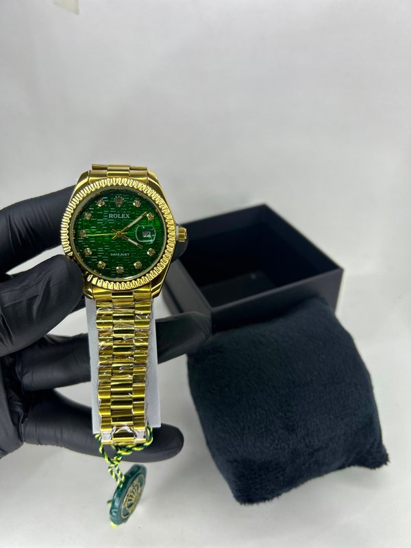 Rolex Datejust Gold – Esmeralda Monograma