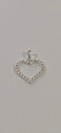 Dije corazón de plata