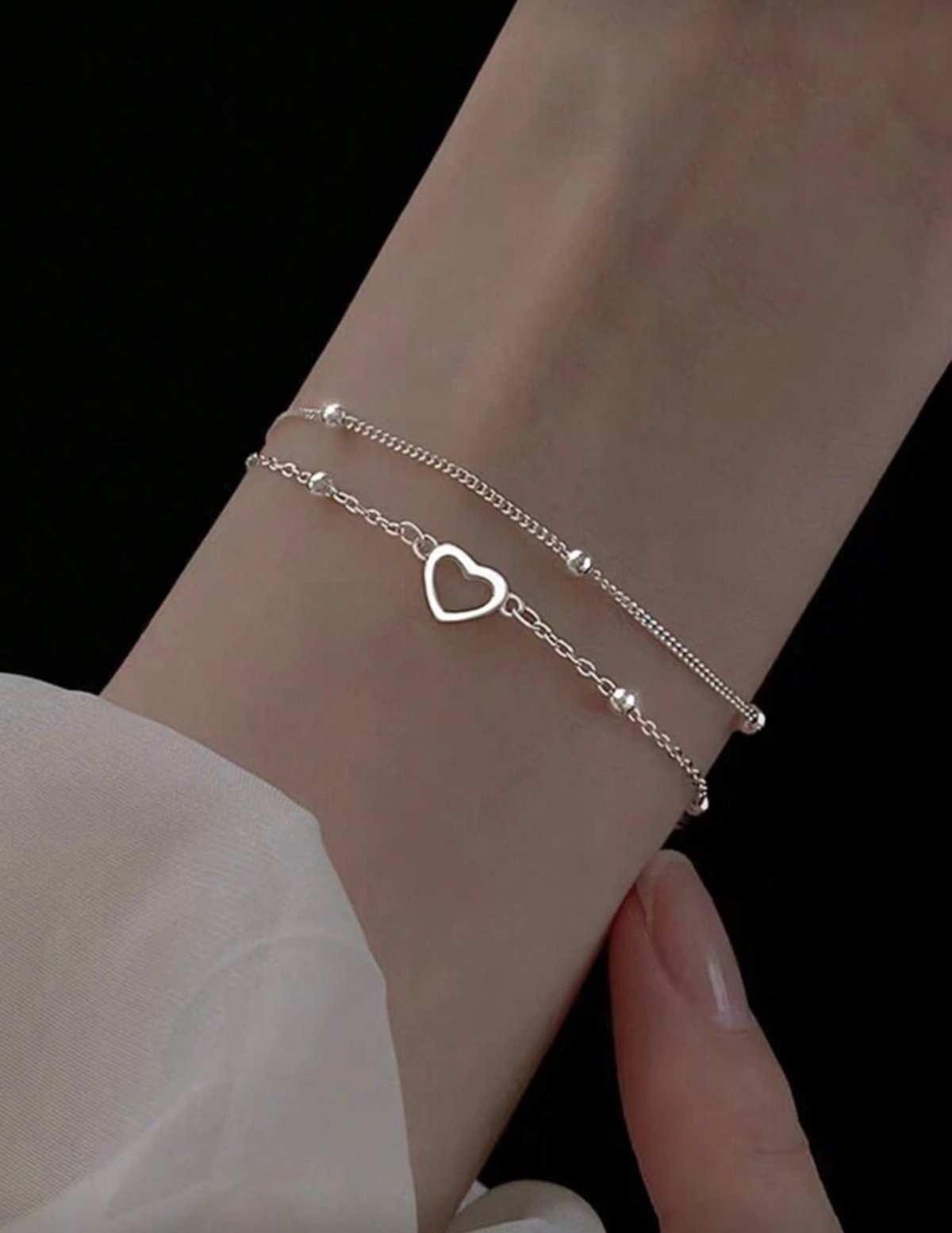 Pulsera corazón plateado 