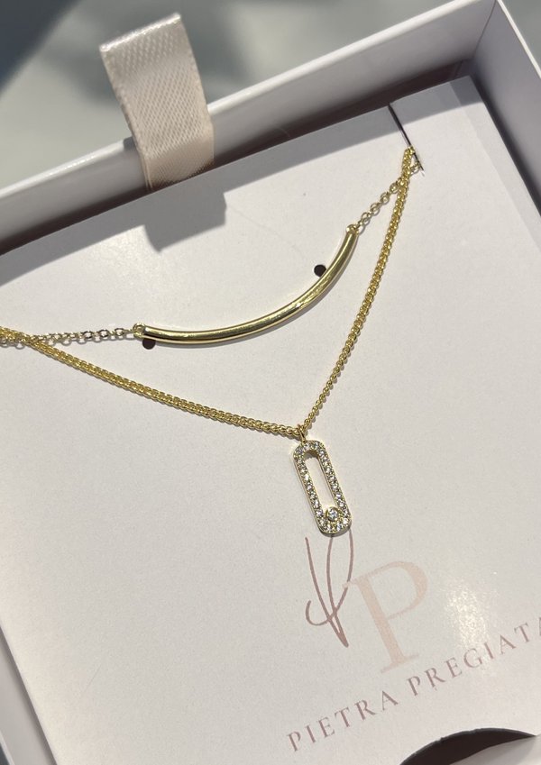 Conjunto de cadenas doradas con barra curva 