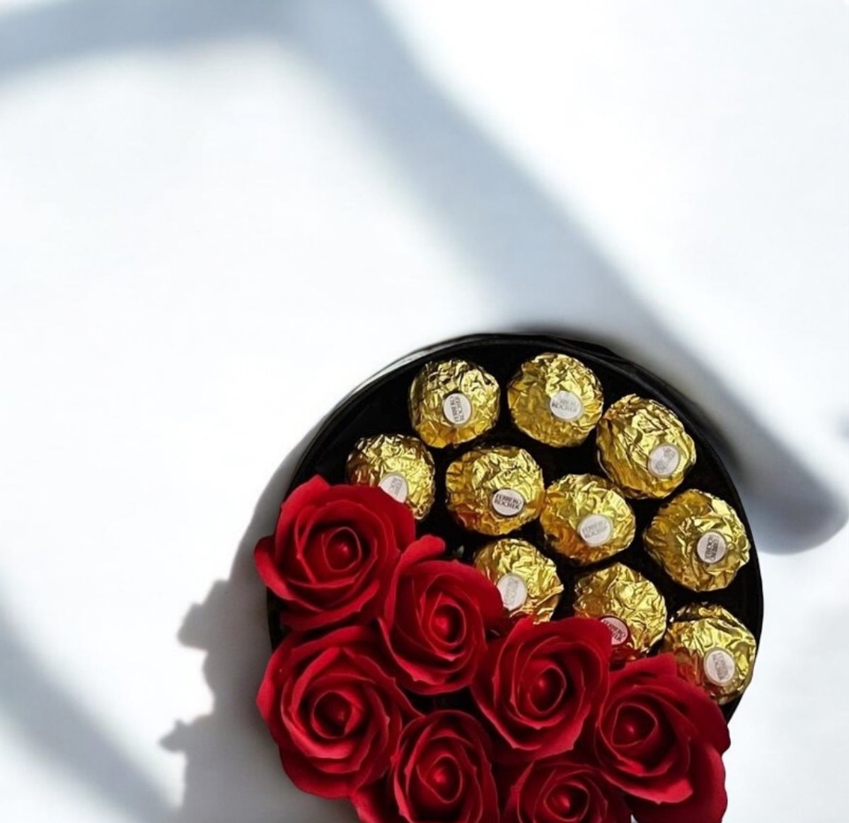 Flores eternas en forma cilindro.