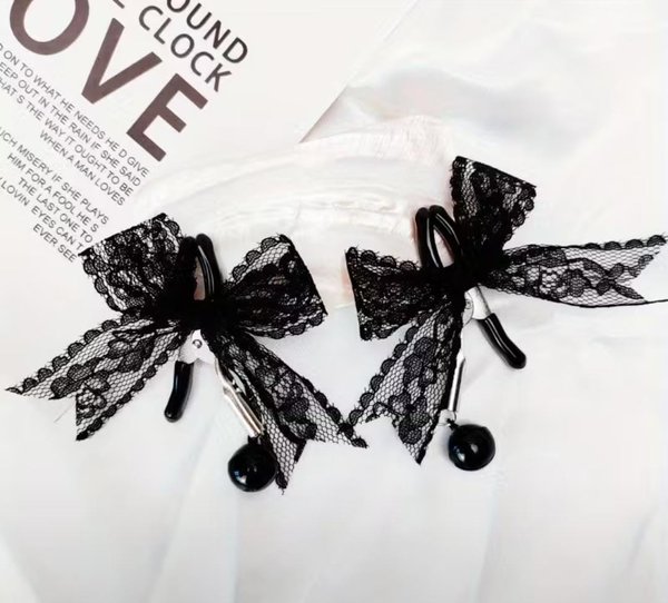 Pinza para pezones con moño 