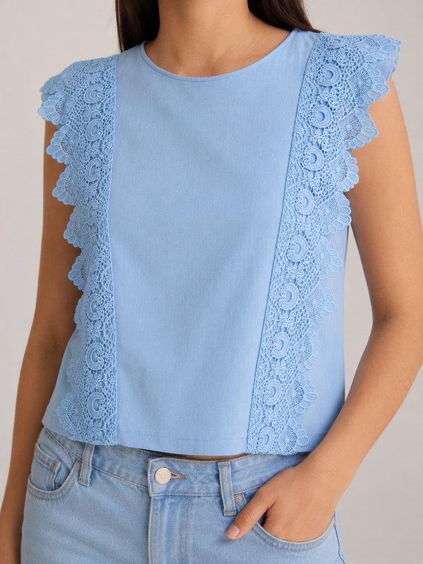 BLUSA SIN MANGA BORDADO